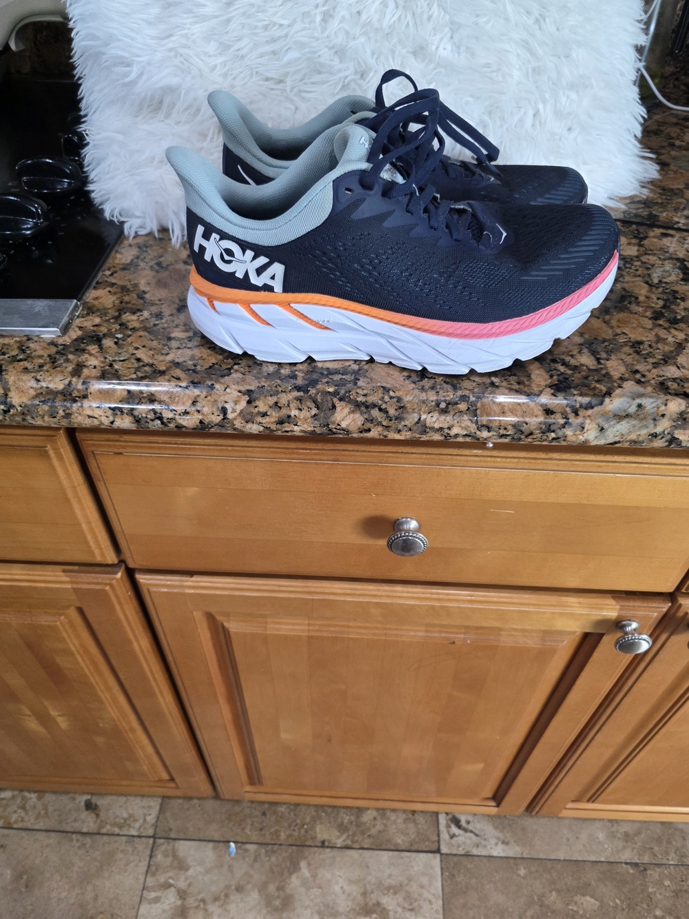 Hoka Women's Black Sneakers with Orange and Pink Accents